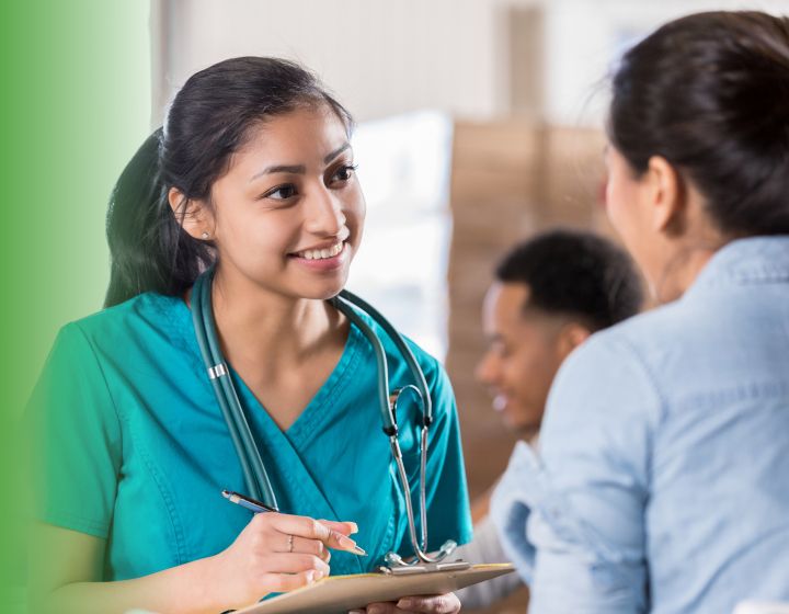 health care professional with clipboard